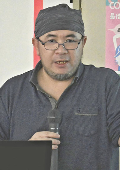 クマの生態などについて講演する望月准教授