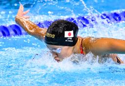 　混合４００メートルメドレーリレー決勝　バタフライで力泳する第３泳者の平井瑞希＝シンガポール（共同）